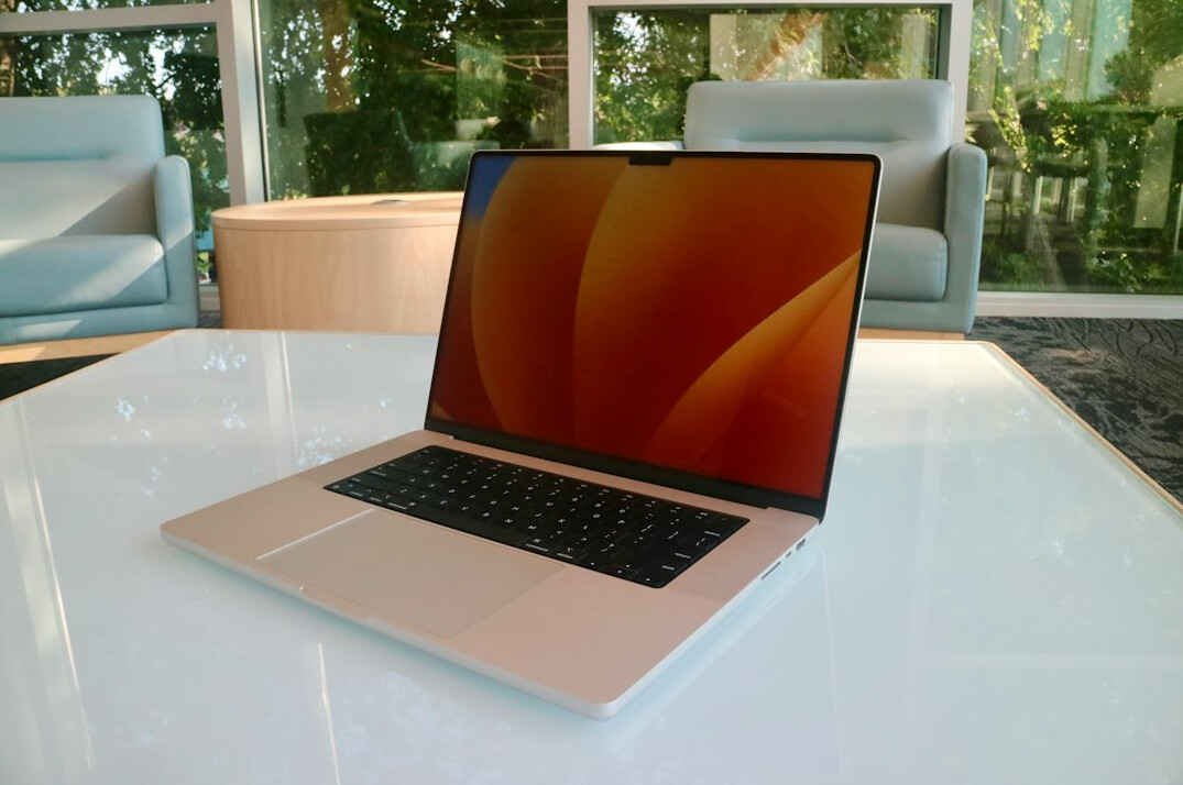 Open laptop with a bright screen on a minimalist desk